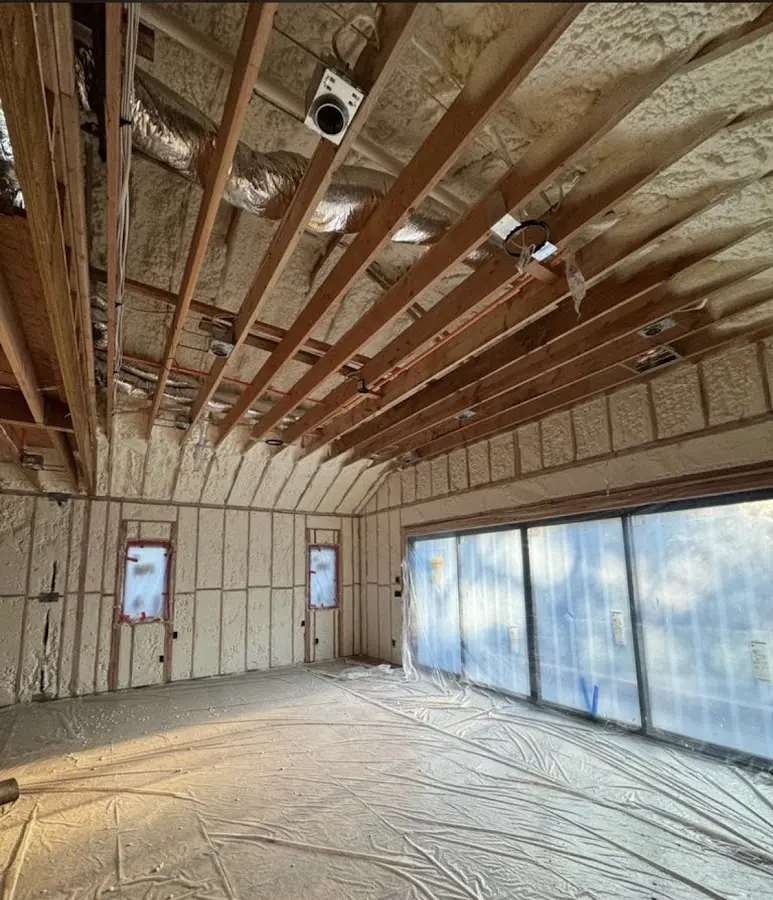 Interior walls and ceiling insulated with spray foam during new construction in Lawndale